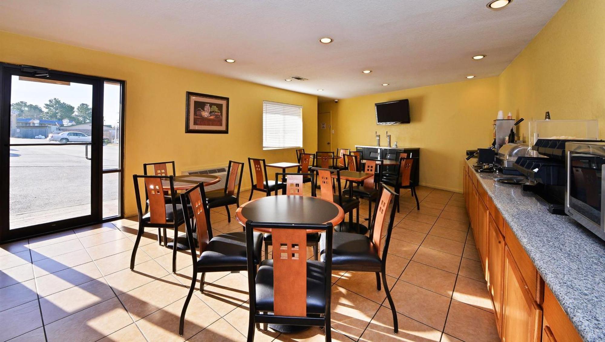 Xecutive Inn And Suites Center Екстериор снимка